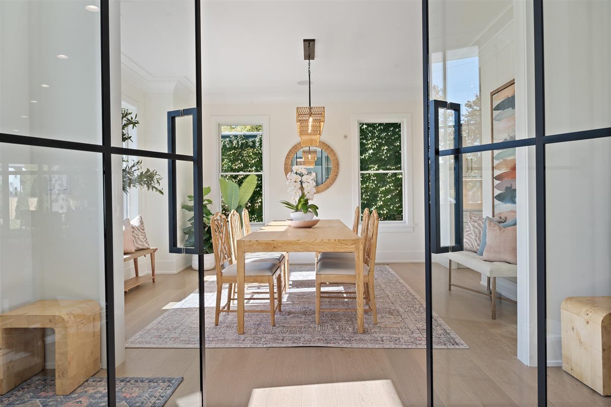 889 Cherry Street Winnetka, IL 60093 - Photo 21 of 76 a living room with a large window and furniture