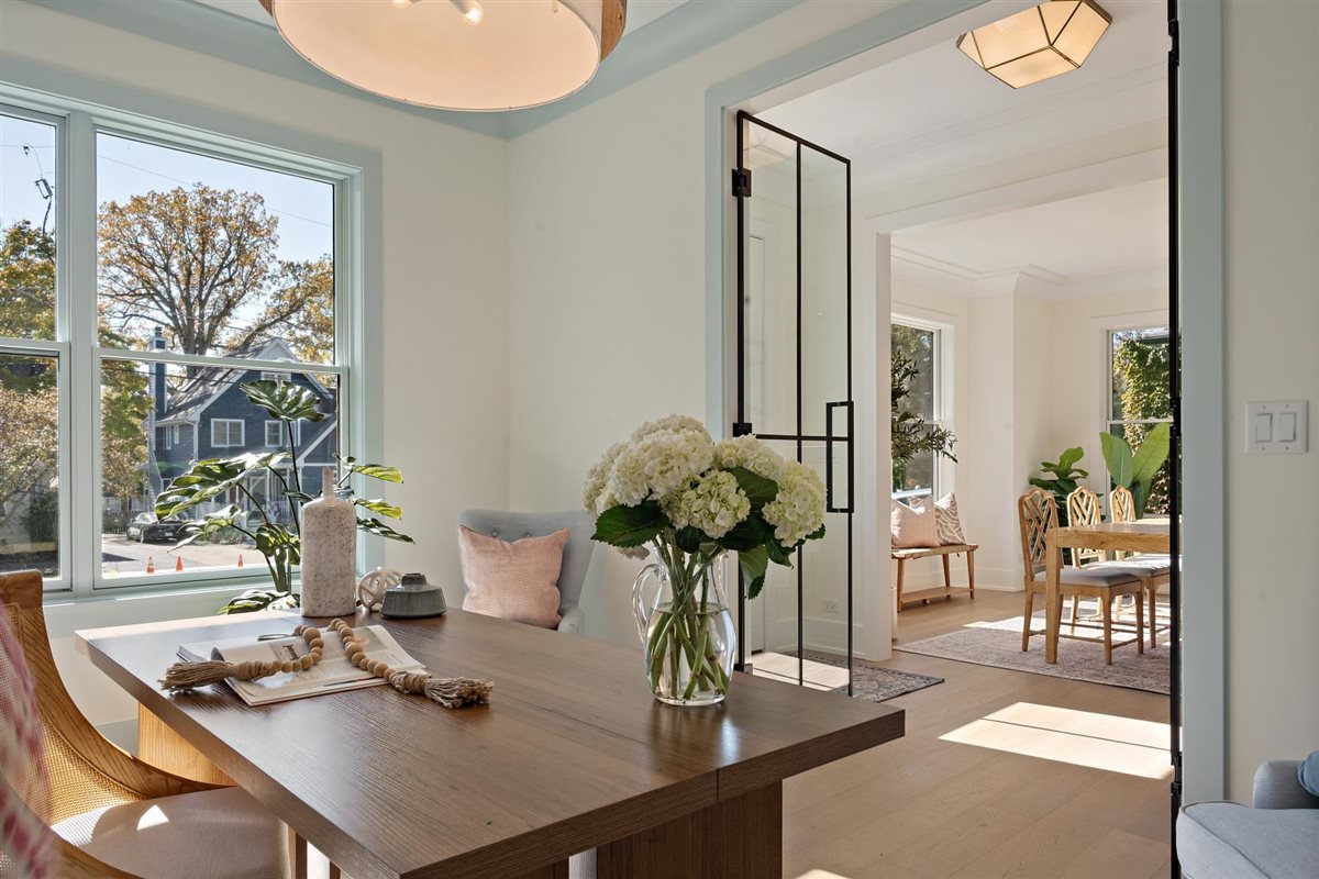 889 Cherry Street Winnetka, IL 60093 - Photo 22 of 76 a view of a dining room with furniture and a window