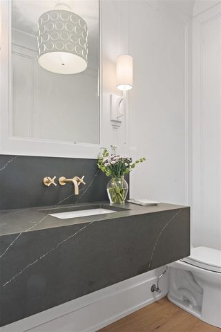 a bathroom with a sink and a shower