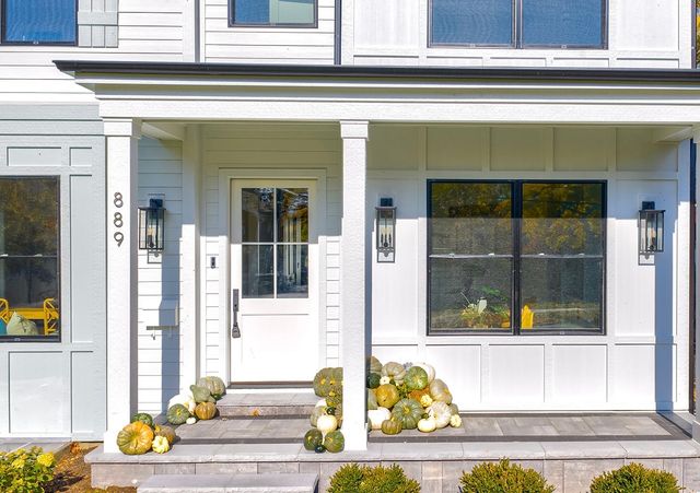 a view of a door front of the house