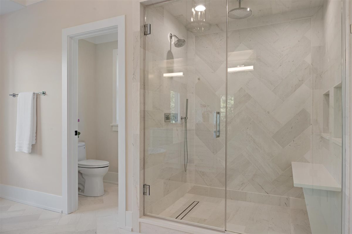 889 Cherry Street Winnetka, IL 60093 - Photo 33 of 76 a bathroom with a shower and a toilet