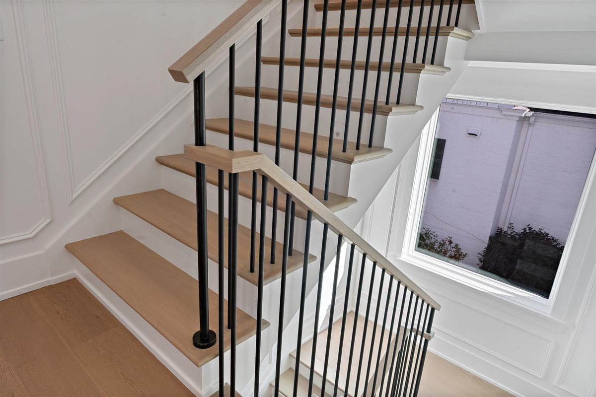889 Cherry Street Winnetka, IL 60093 - Photo 44 of 76 a view of staircase with railing and white walls