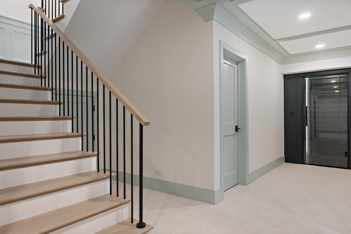 889 Cherry Street Winnetka, IL 60093 - Photo 52 of 76 a view of a hallway with staircase