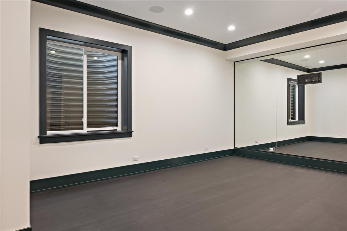 889 Cherry Street Winnetka, IL 60093 - Photo 59 of 76 a view of an empty room with a window