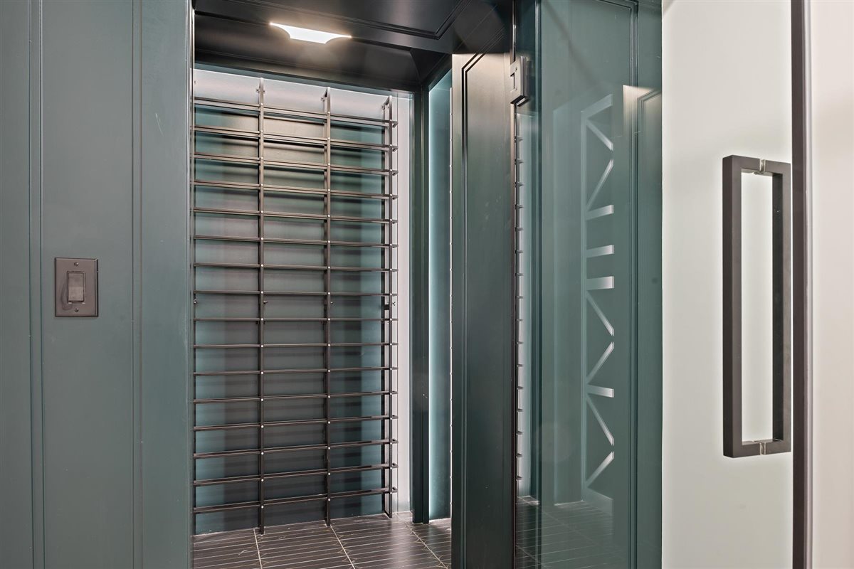 889 Cherry Street Winnetka, IL 60093 - Photo 60 of 76 a bathroom with a shower and a glass door