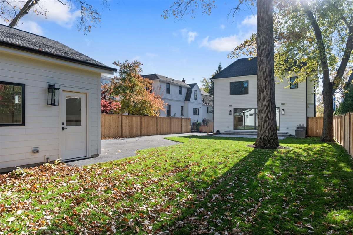 889 Cherry Street Winnetka, IL 60093 - Photo 69 of 76 a view of a house with backyard and tree