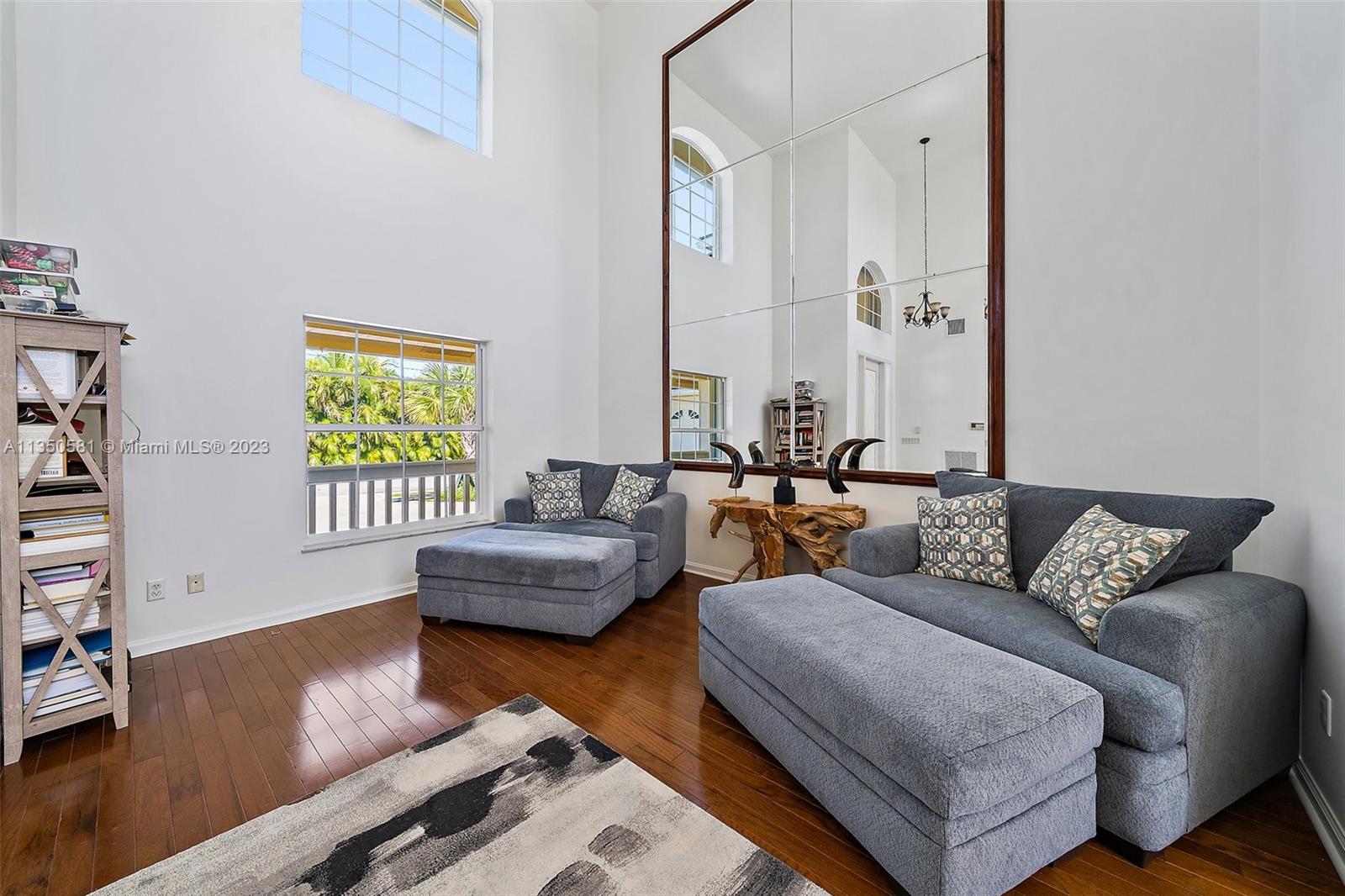 32 Coconut Lane Tequesta, FL 33469 - Photo 13 of 56 a living room with furniture and a window