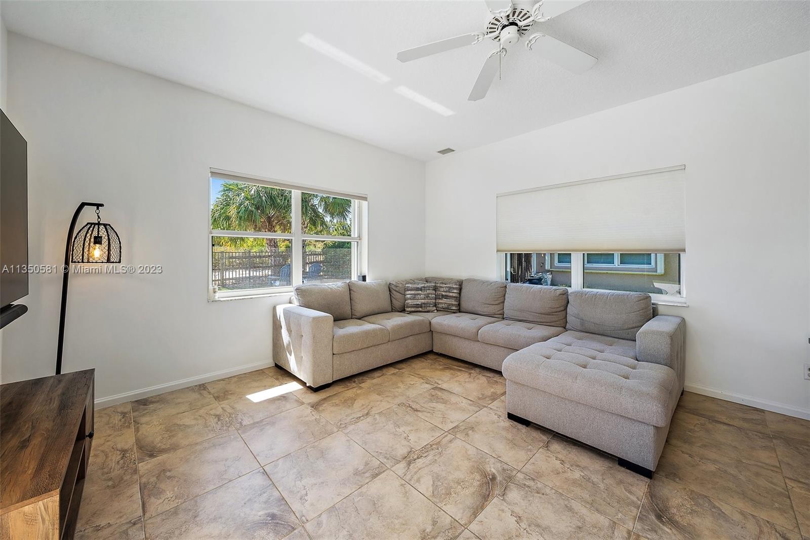 32 Coconut Lane Tequesta, FL 33469 - Photo 23 of 56 a living room with furniture and a window