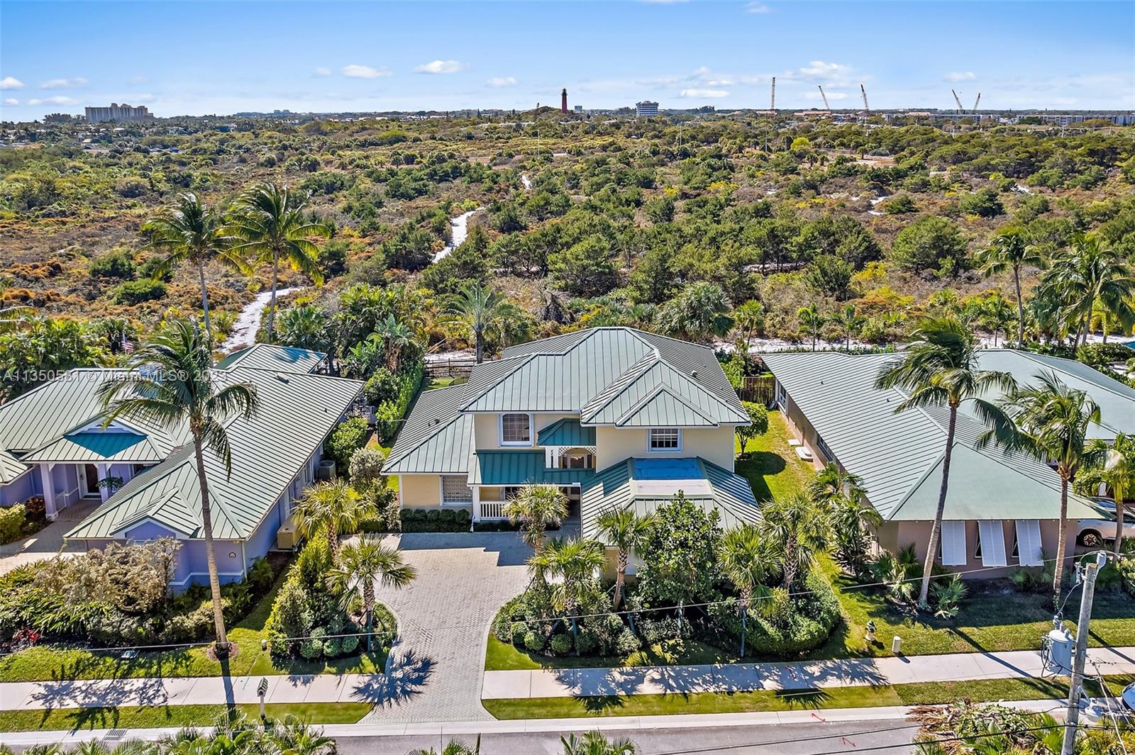 32 Coconut Lane Tequesta, FL 33469 - Photo 3 of 56 an aerial view of multiple house