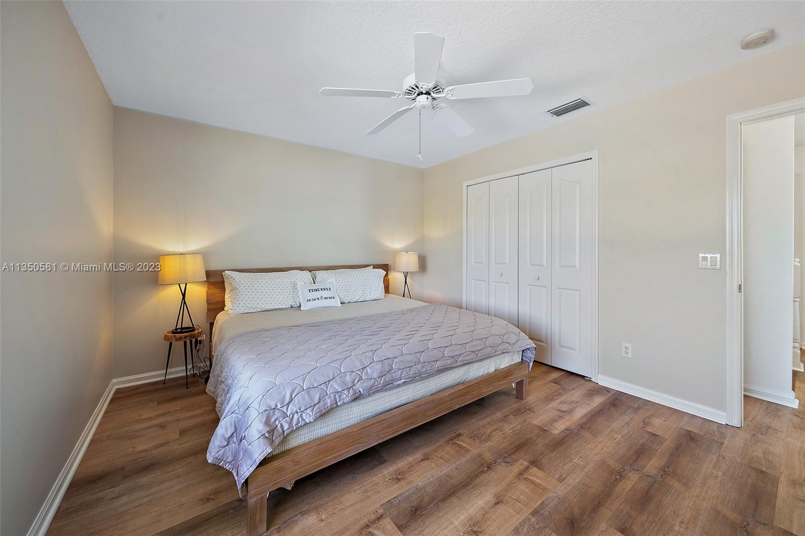 32 Coconut Lane Tequesta, FL 33469 - Photo 36 of 56 a bedroom with a bed and window