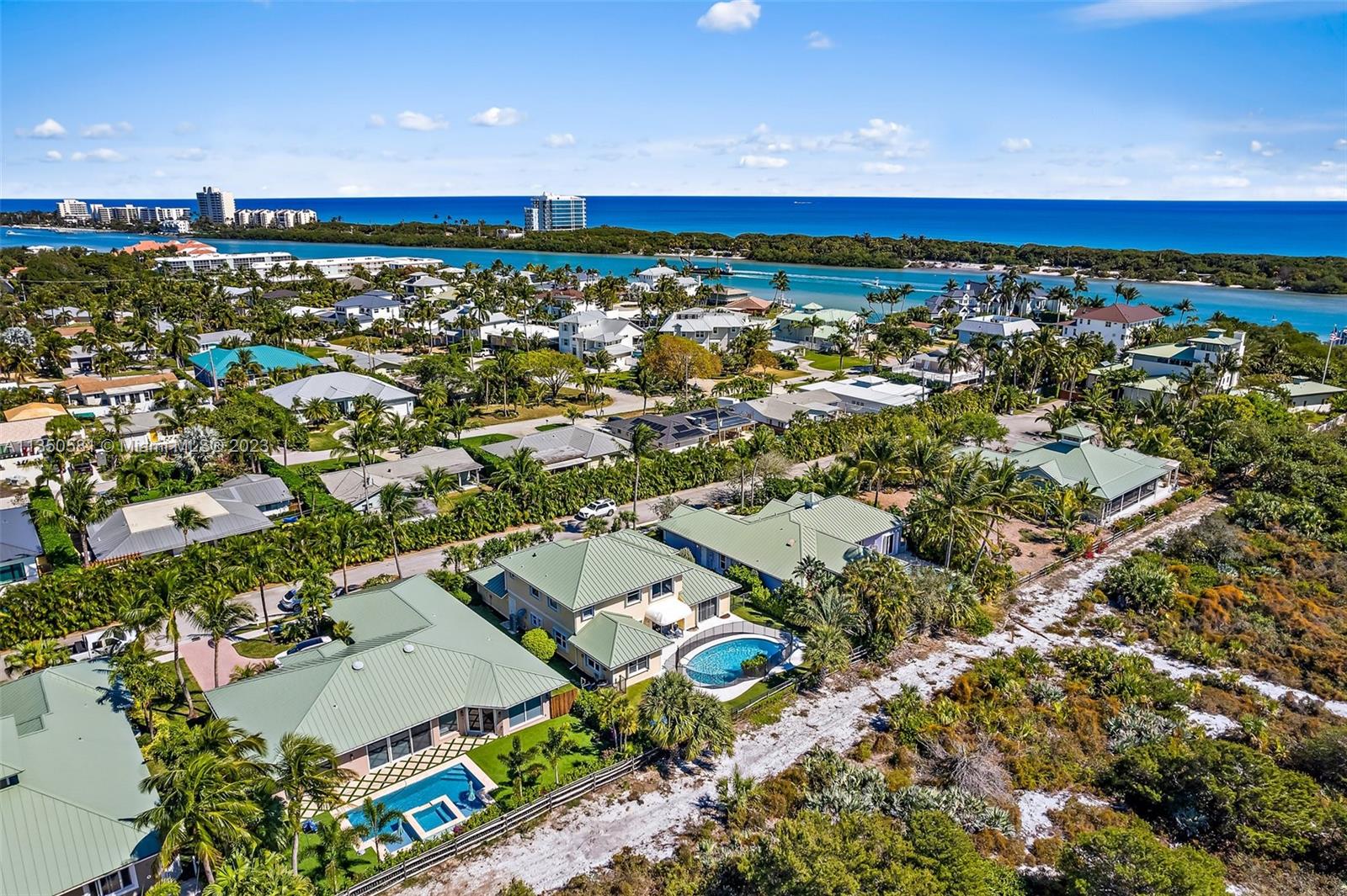 32 Coconut Lane Tequesta, FL 33469 - Photo 49 of 56 an aerial view of residential building with parking space