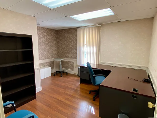 a room with furniture and a window