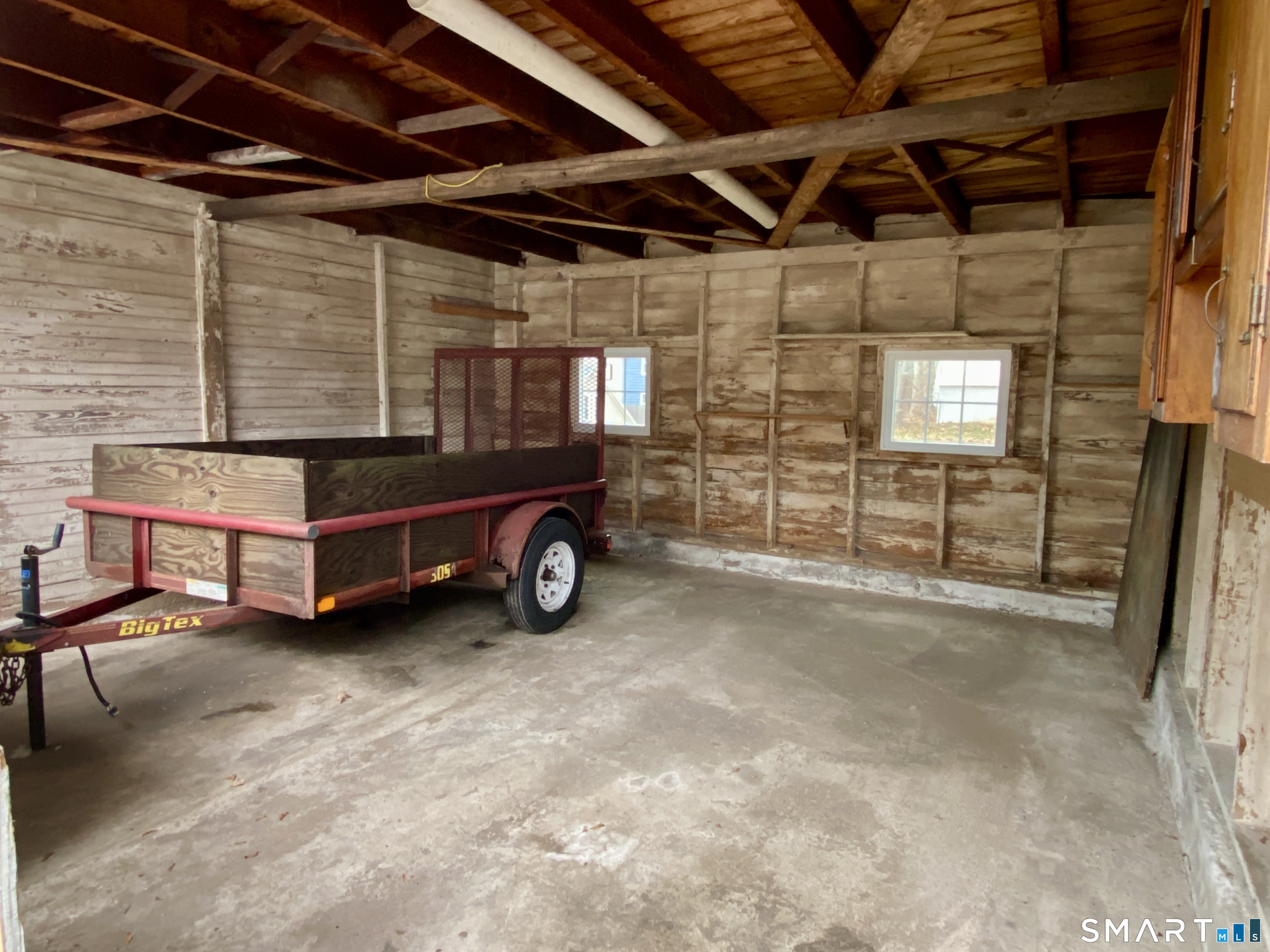 140 Union Street Vernon, CT 06066 - Photo 21 of 26 a car is parked in a garage