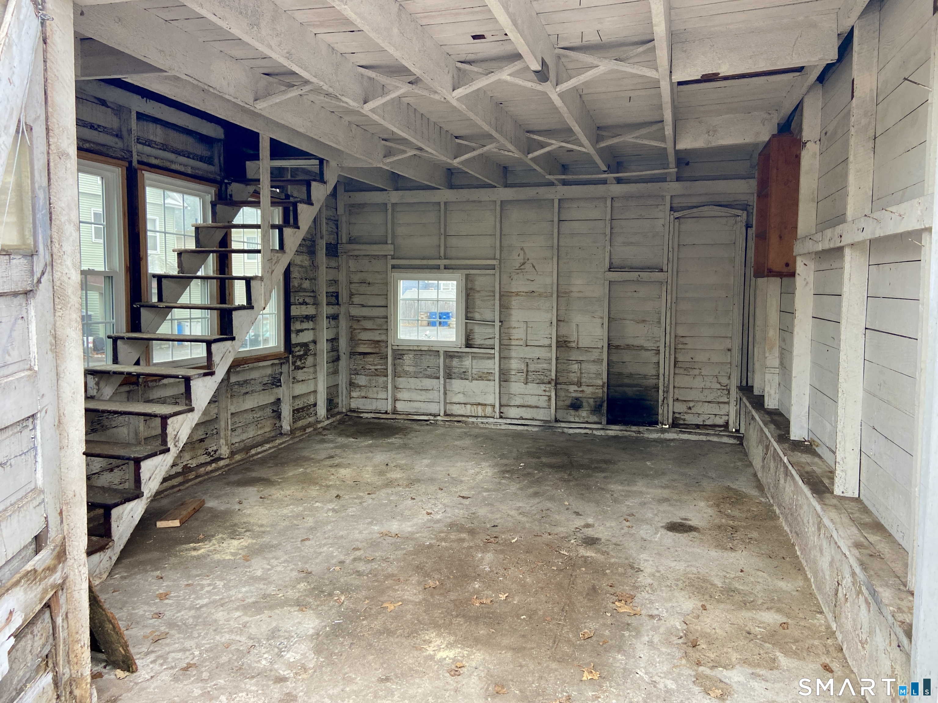 140 Union Street Vernon, CT 06066 - Photo 22 of 26 a view of an empty room with a fireplace
