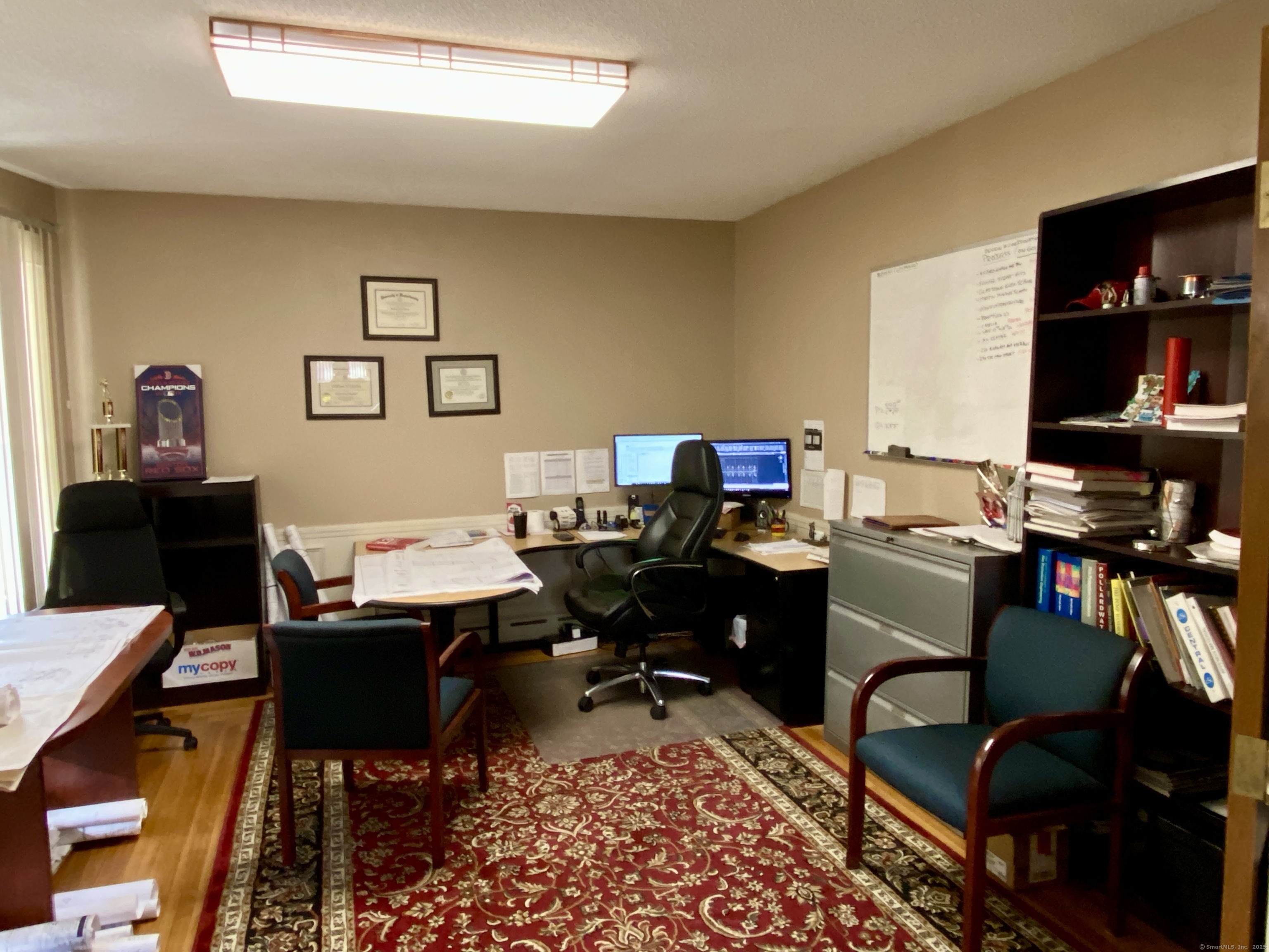 140 Union Street Vernon, CT 06066 - Photo 7 of 26 a view of a workspace with a window