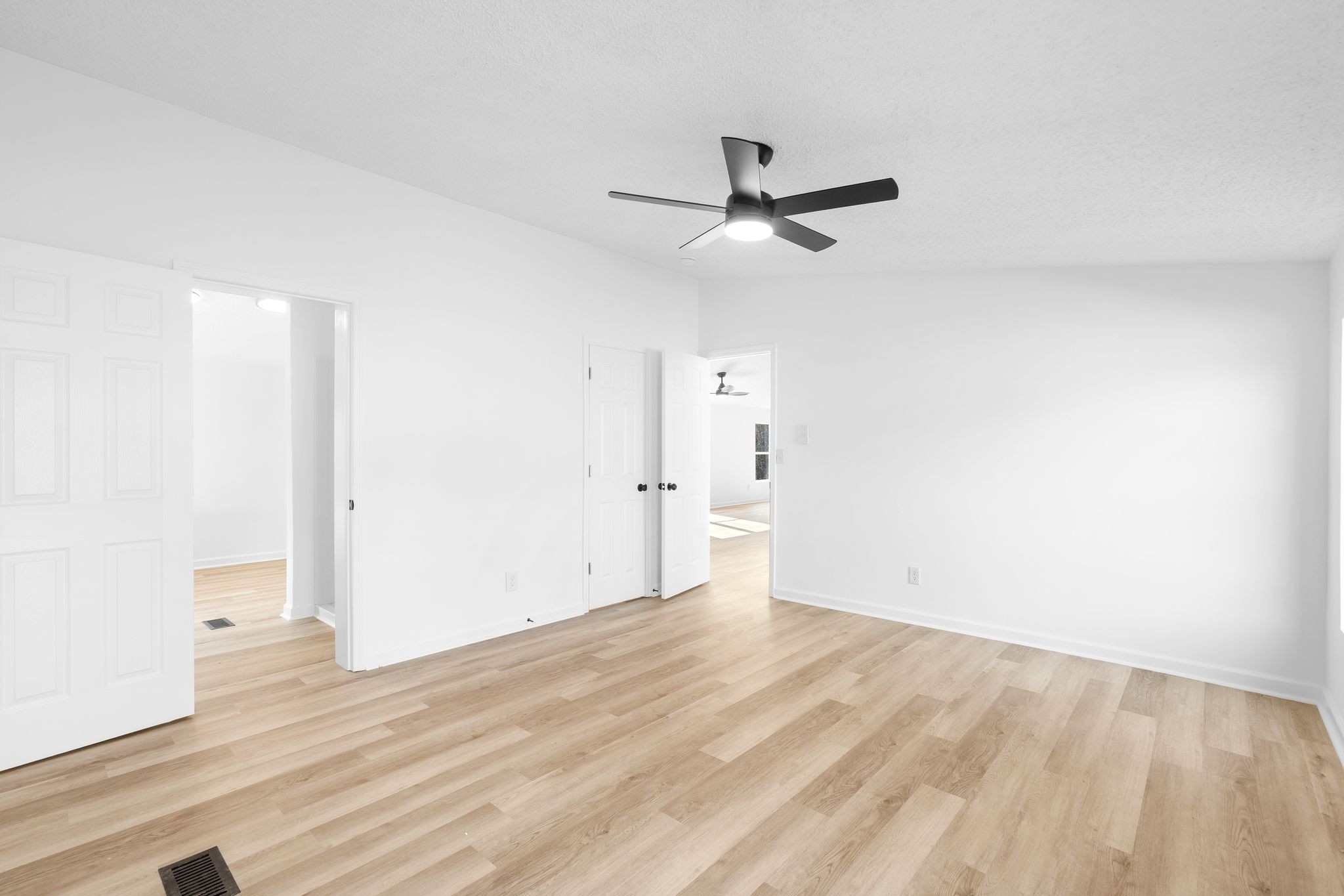 3092 McKibbon Road Culleoka, TN 38451 - Photo 26 of 41 a view of a big room with wooden floor and windows in a room
