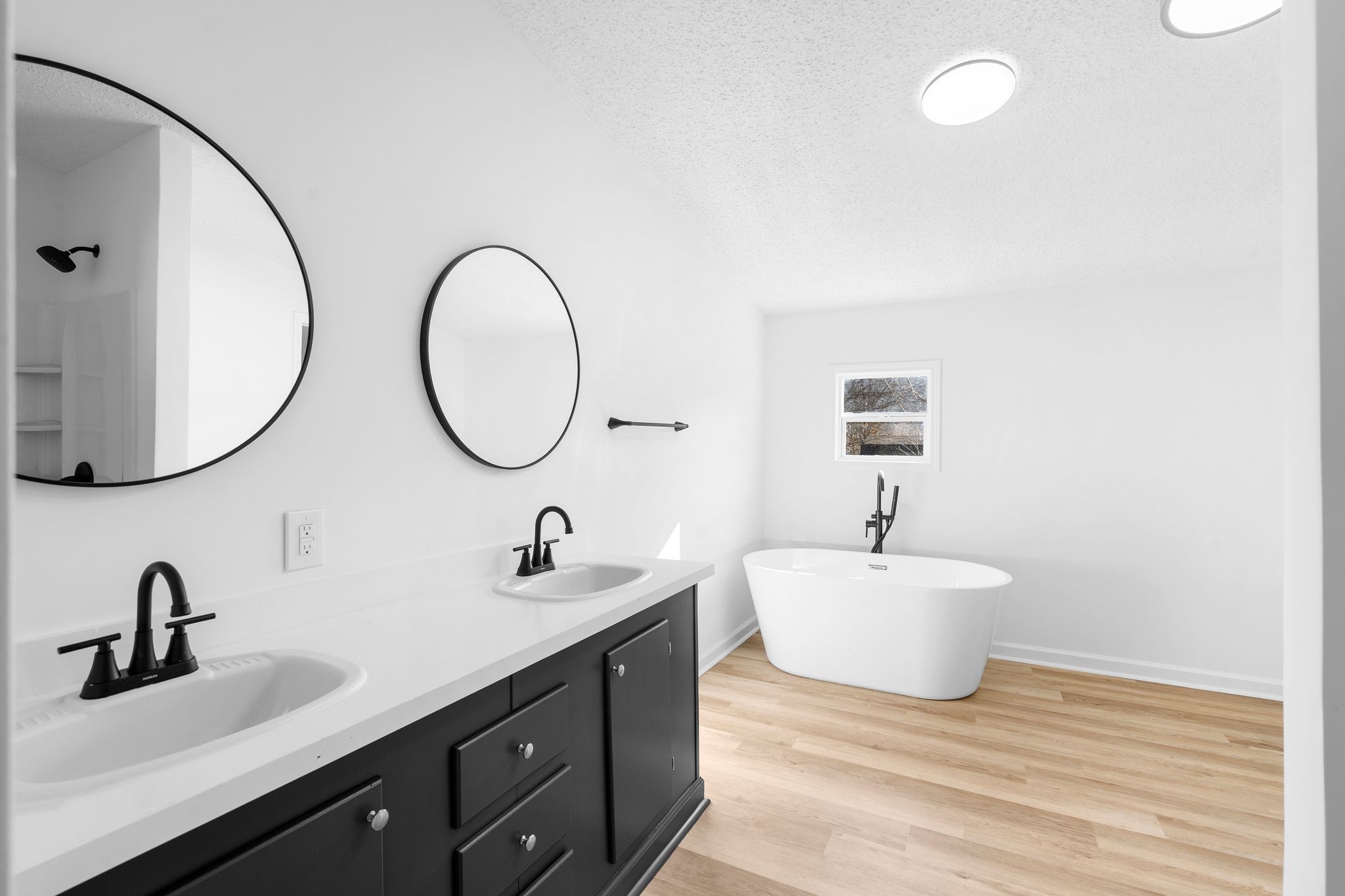 3092 McKibbon Road Culleoka, TN 38451 - Photo 29 of 41 a bathroom with a sink and a mirror