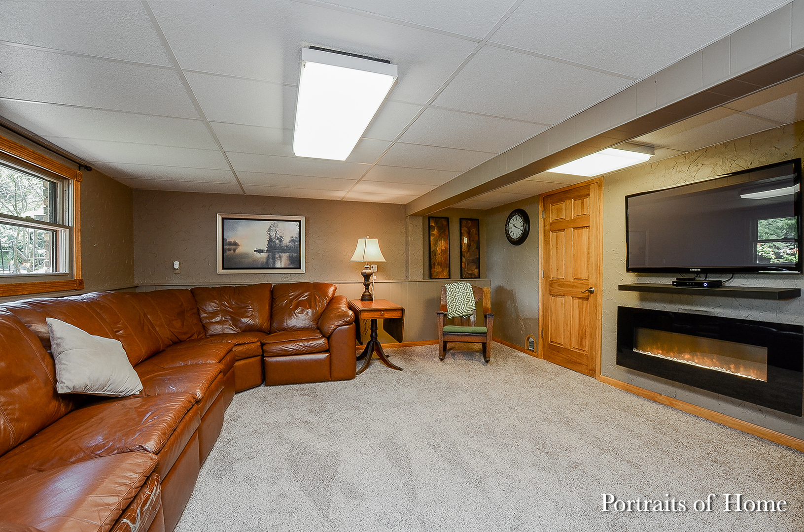1805 South Tyler Road St. Charles, IL 60174 - Photo 14 of 17 a living room with furniture and a flat screen tv