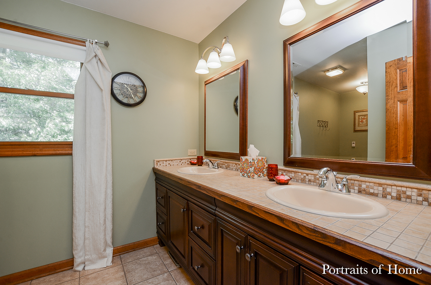 1805 South Tyler Road St. Charles, IL 60174 - Photo 7 of 17 a bathroom with a sink and a mirror