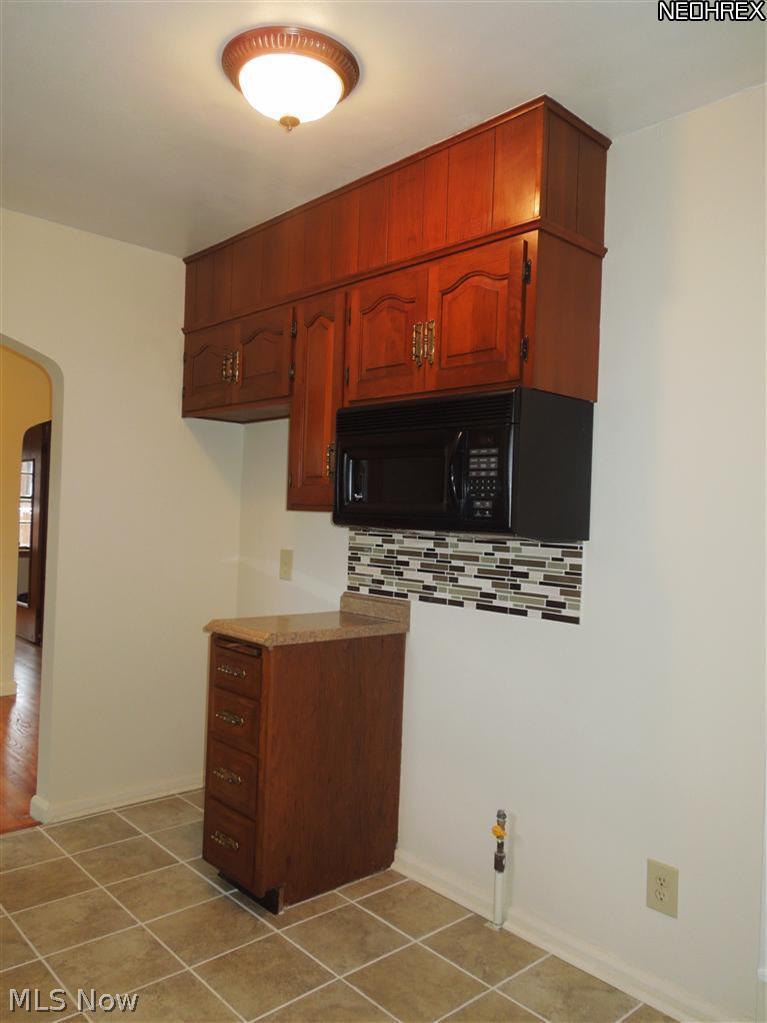 4575 Center Road Brunswick, OH 44212 - Photo 15 of 15 Built-in microwave as counter space. A gas stove can be included if buyer would like that too!