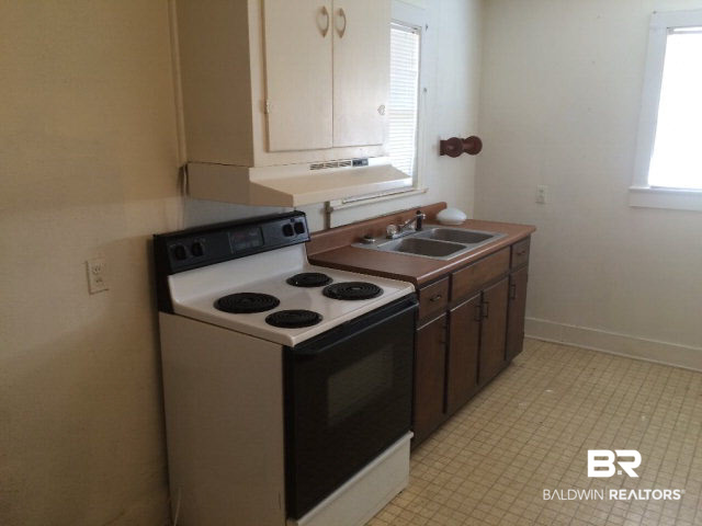 9460 Celeste Road Saraland, AL 36571 - Photo 9 of 13 Four burner electric stove is included.