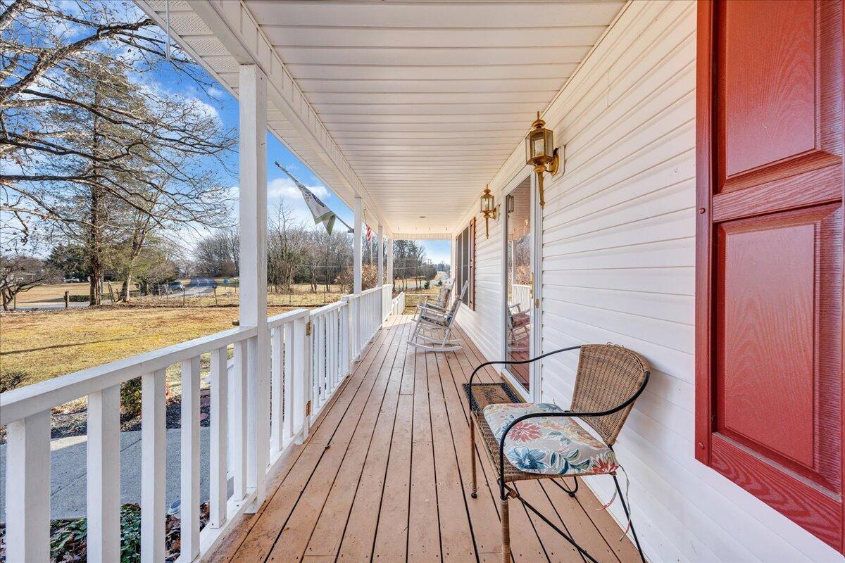 2695 Hardy Road Hardy, VA 24101 - Photo 3 of 36 a view of a balcony with furniture and wooden floor