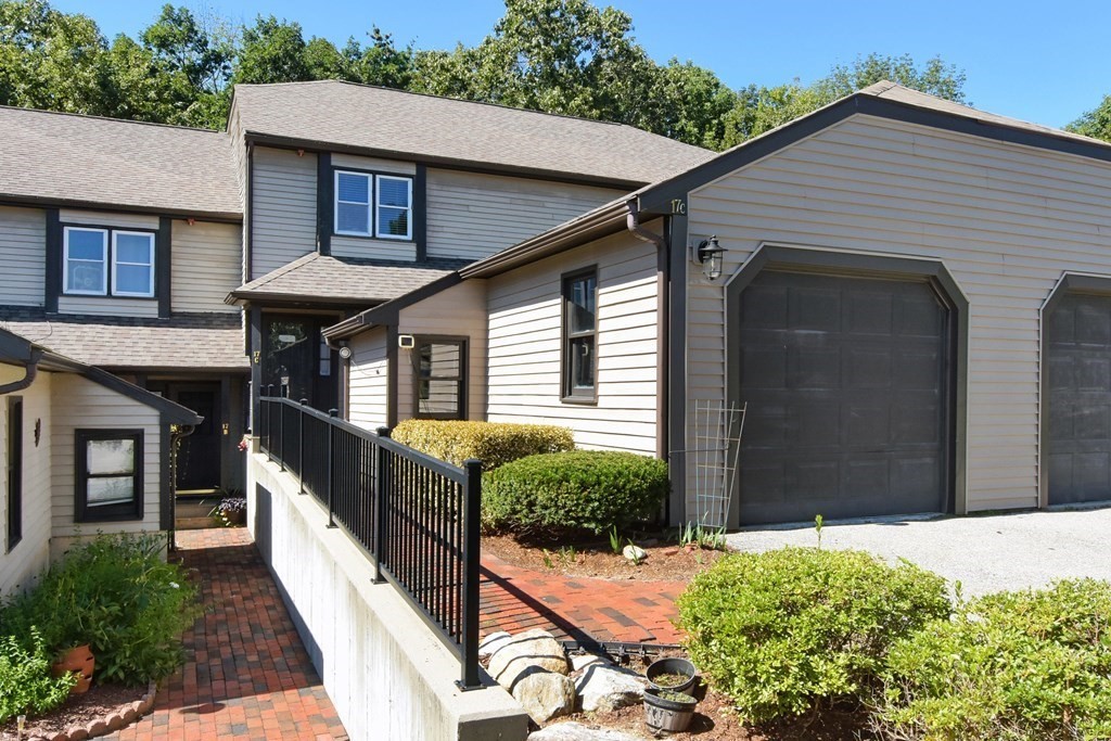 17 Highfield Road, Unit C Charlton, MA 01507 - Photo 1 of 31 a front view of a house with balcony