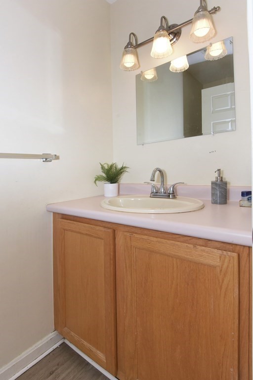 17 Highfield Road, Unit C Charlton, MA 01507 - Photo 13 of 31 a bathroom with a sink and a mirror