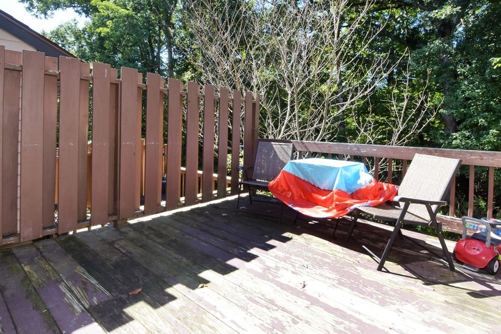 17 Highfield Road, Unit C Charlton, MA 01507 - Photo 29 of 31 a view of outdoor space with wooden floor and trees