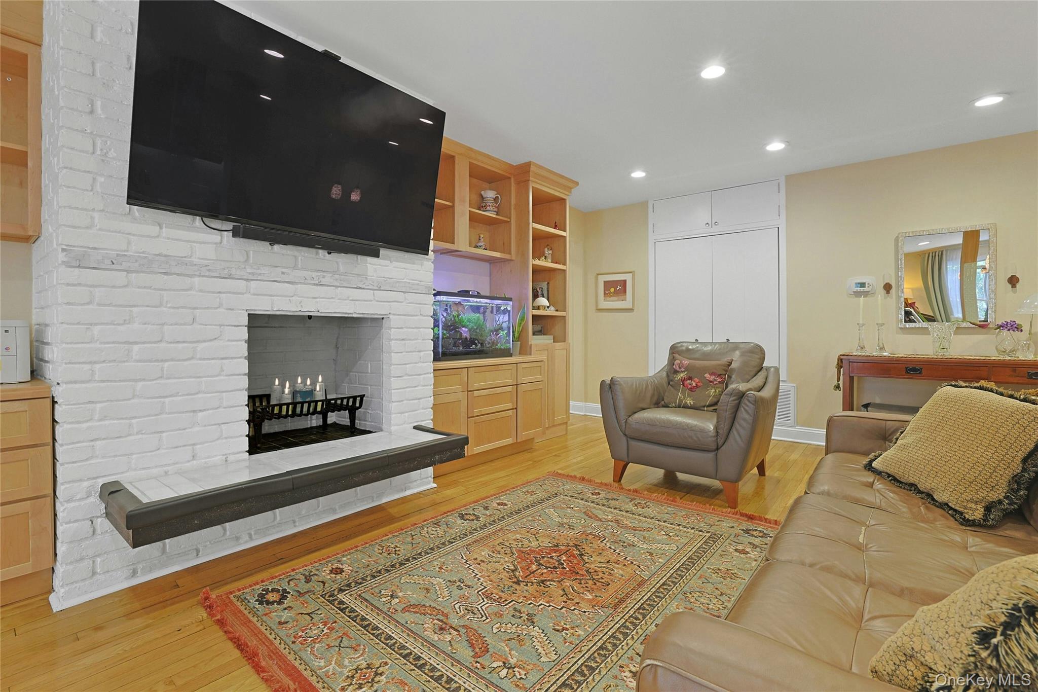 216 Purchase Street, Unit 1F Rye, NY 10580 - Photo 13 of 26 enjoy your fireplace while relaxing