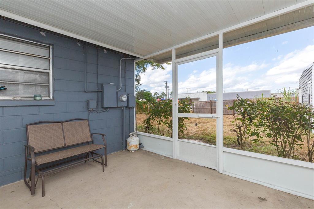 821 Walnut Drive Seffner, FL 33584 - Photo 17 of 19 a room with furniture and a window