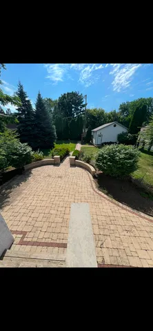 a view of swimming pool from a yard