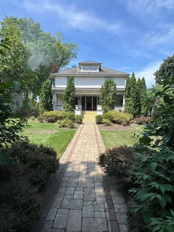 a view of a house with garden