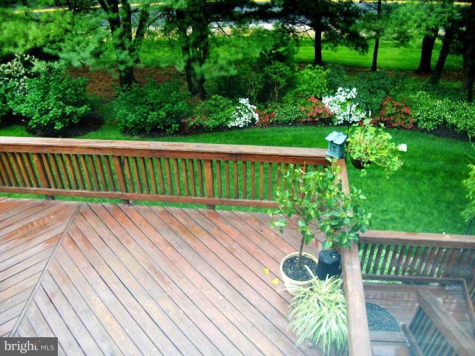 6811 Mallow Court Springfield, VA 22152 - Photo 11 of 30 a view of balcony with wooden floor