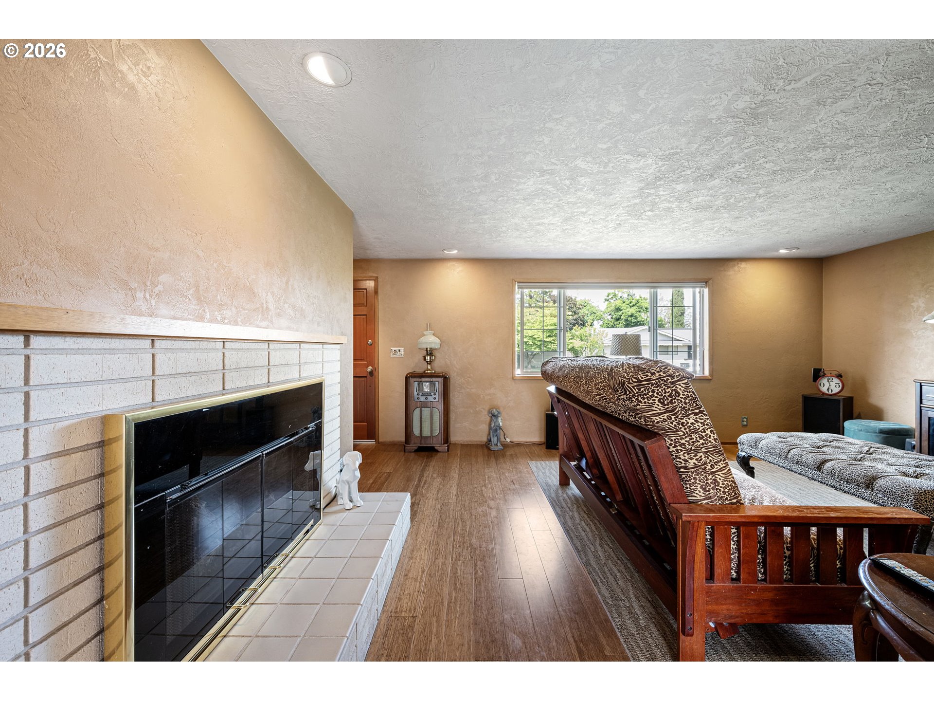 2465 17th Street Springfield, OR 97477 - Photo 9 of 47 a living room with furniture and a fireplace