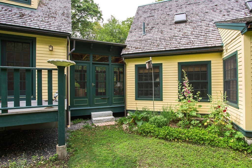 79 East Princeton Road Princeton, MA 01541 - Photo 25 of 30 a view of brick house with a large windows and a yard