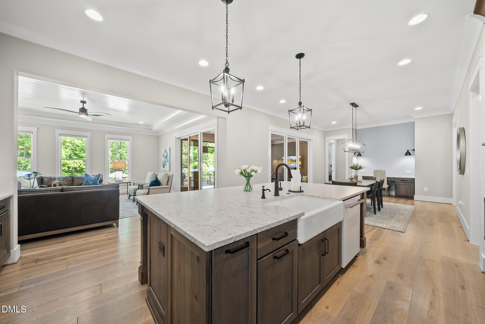 67 Nuthatch Pittsboro, NC 27312 - Photo 20 of 50 a large kitchen with kitchen island a sink counter space dining table and chairs