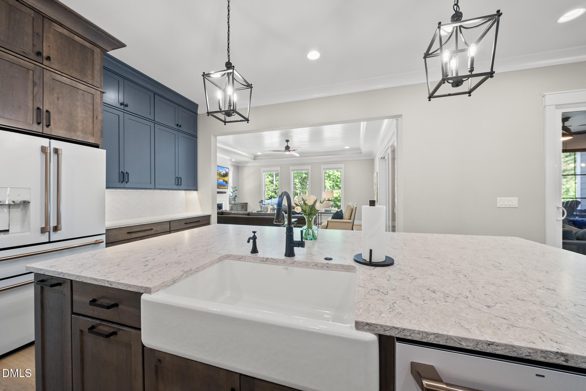 67 Nuthatch Pittsboro, NC 27312 - Photo 23 of 50 a kitchen with a table a sink and cabinets
