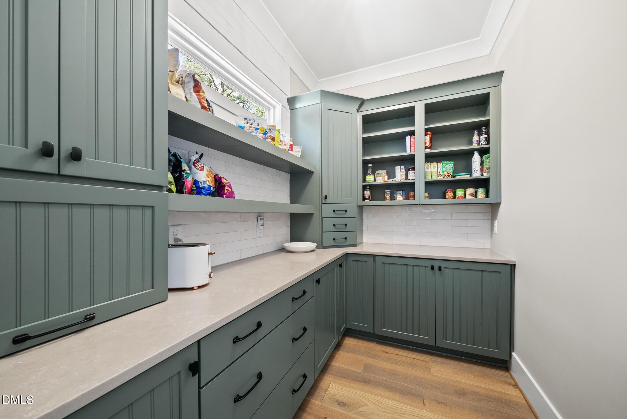 67 Nuthatch Pittsboro, NC 27312 - Photo 24 of 50 a kitchen with a cabinets and window