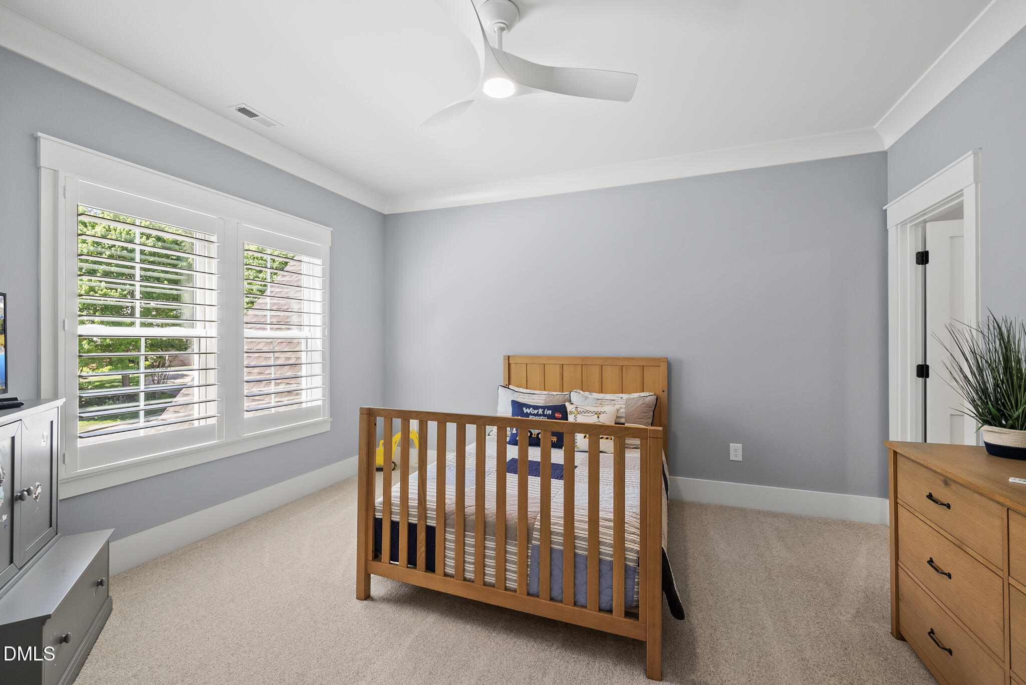 67 Nuthatch Pittsboro, NC 27312 - Photo 35 of 50 a view of a bedroom with furniture window and a ceiling fan