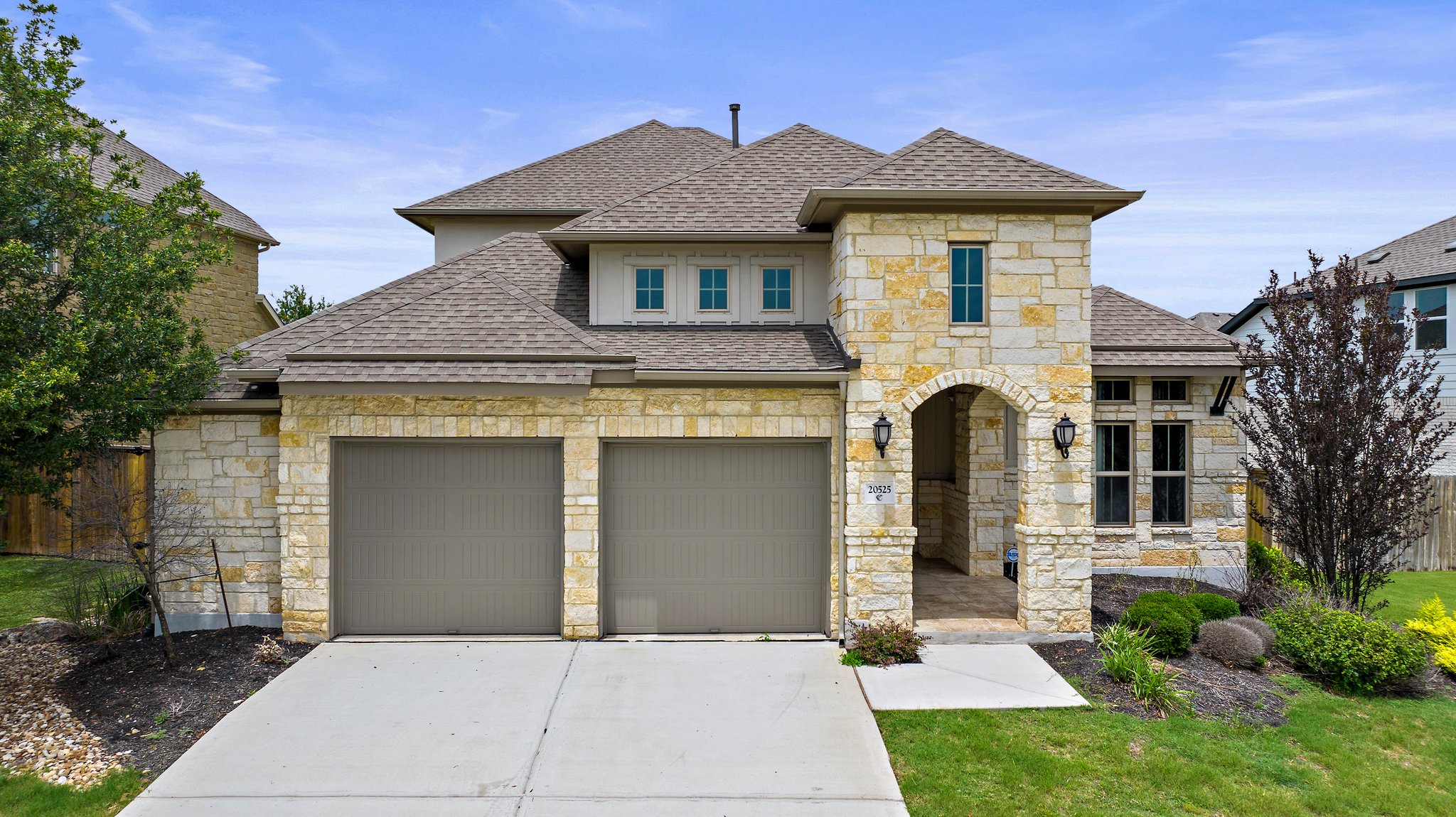 20525 Martin Lane Pflugerville, TX 78660 - Photo 1 of 1 a front view of a house with garden