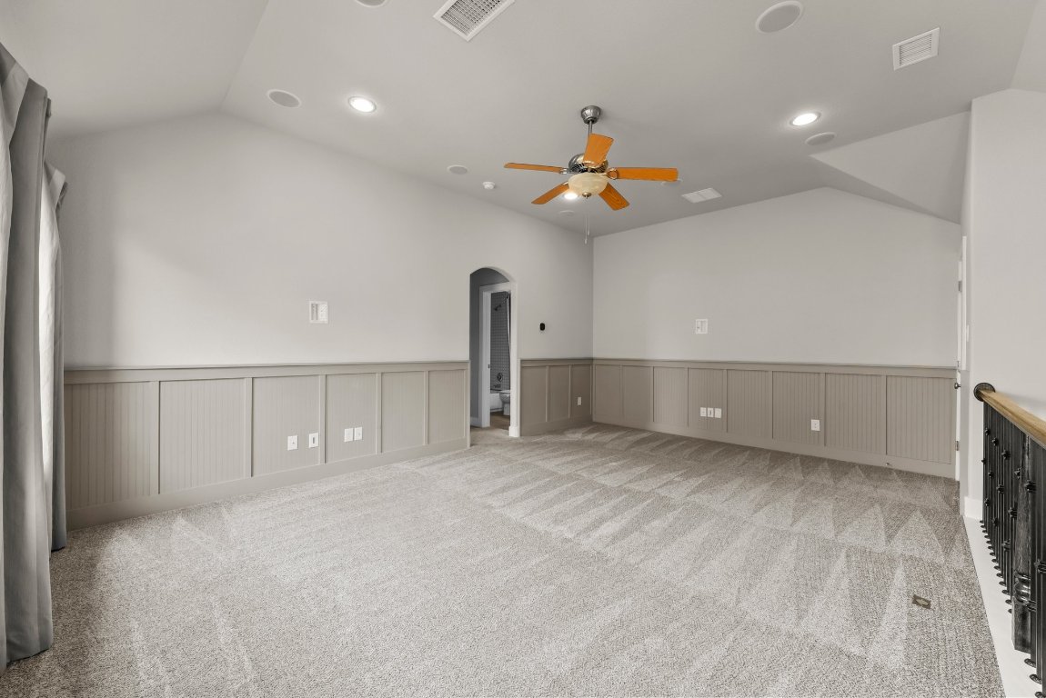 20525 Martin Lane Pflugerville, TX 78660 - Photo 28 of 40 Game night, movie marathons, or Taylor Swift dance parties—this upstairs lounge handles it all.