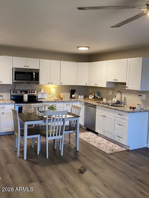 1440 North Idaho Road, Unit 2101 Apache Junction, AZ 85119 - Photo 4 of 23 1440 N Idaho #2101 Kitchen Dining Pic 3