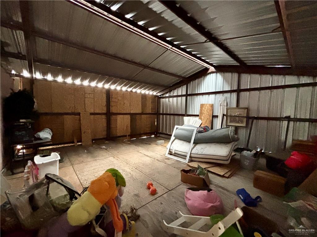 209 Rafael Street Sullivan City, TX 78595 - Photo 12 of 15 a view of a room with gym equipment