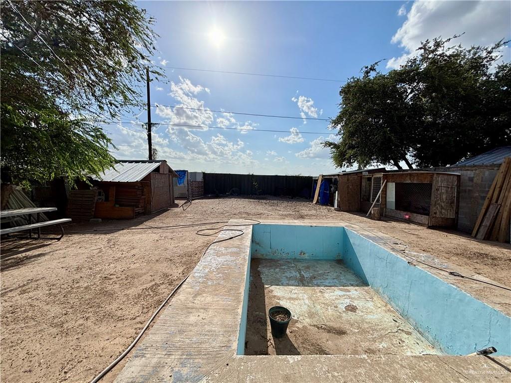 209 Rafael Street Sullivan City, TX 78595 - Photo 13 of 15 a view of swimming pool with chairs