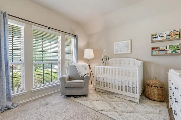 a bedroom with furniture and a couch