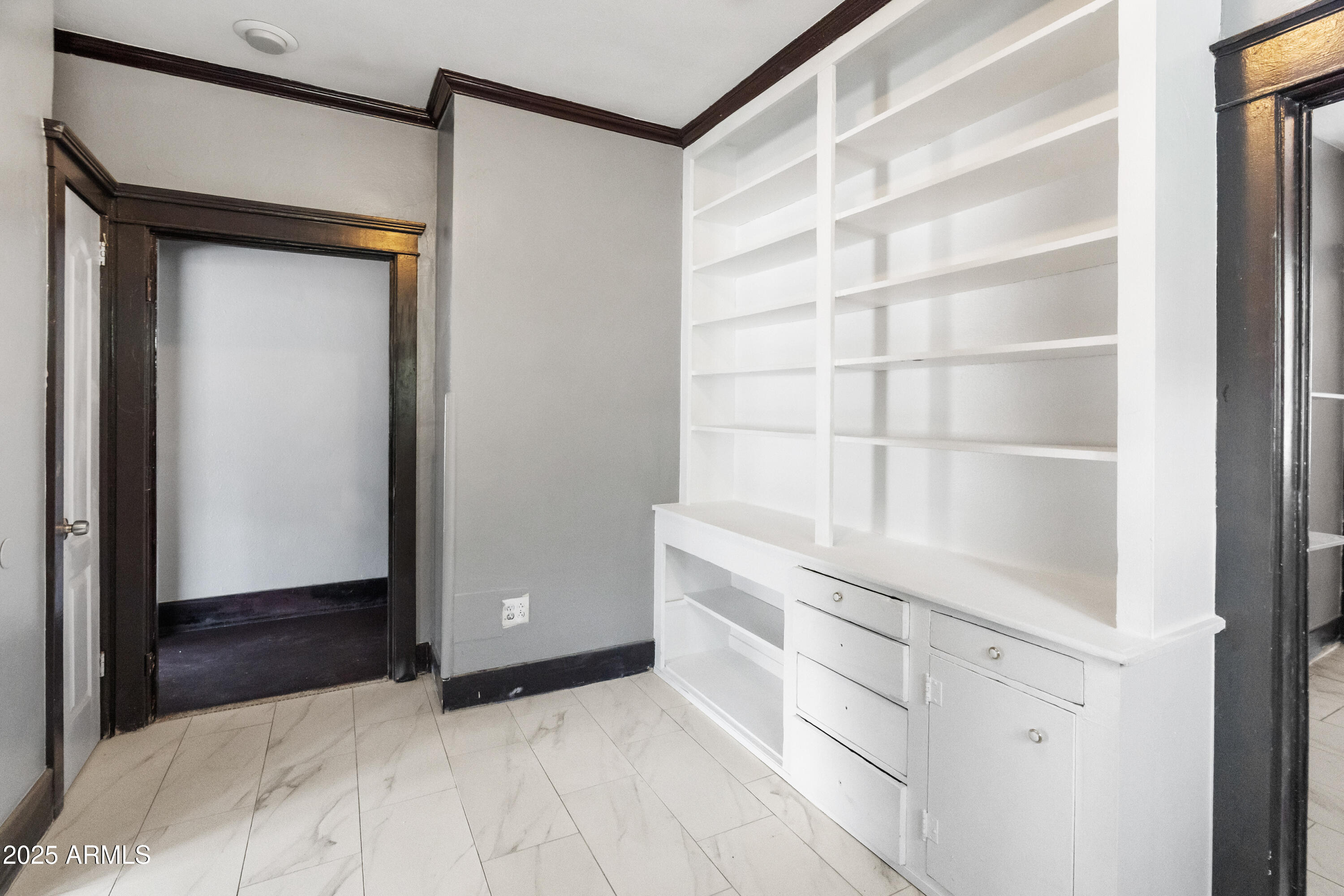 122 North 9th Avenue Phoenix, AZ 85007 - Photo 22 of 43 a view of walk in closet with empty racks