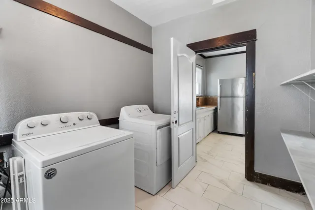 a view of a livingroom with furniture ceiling fan and window