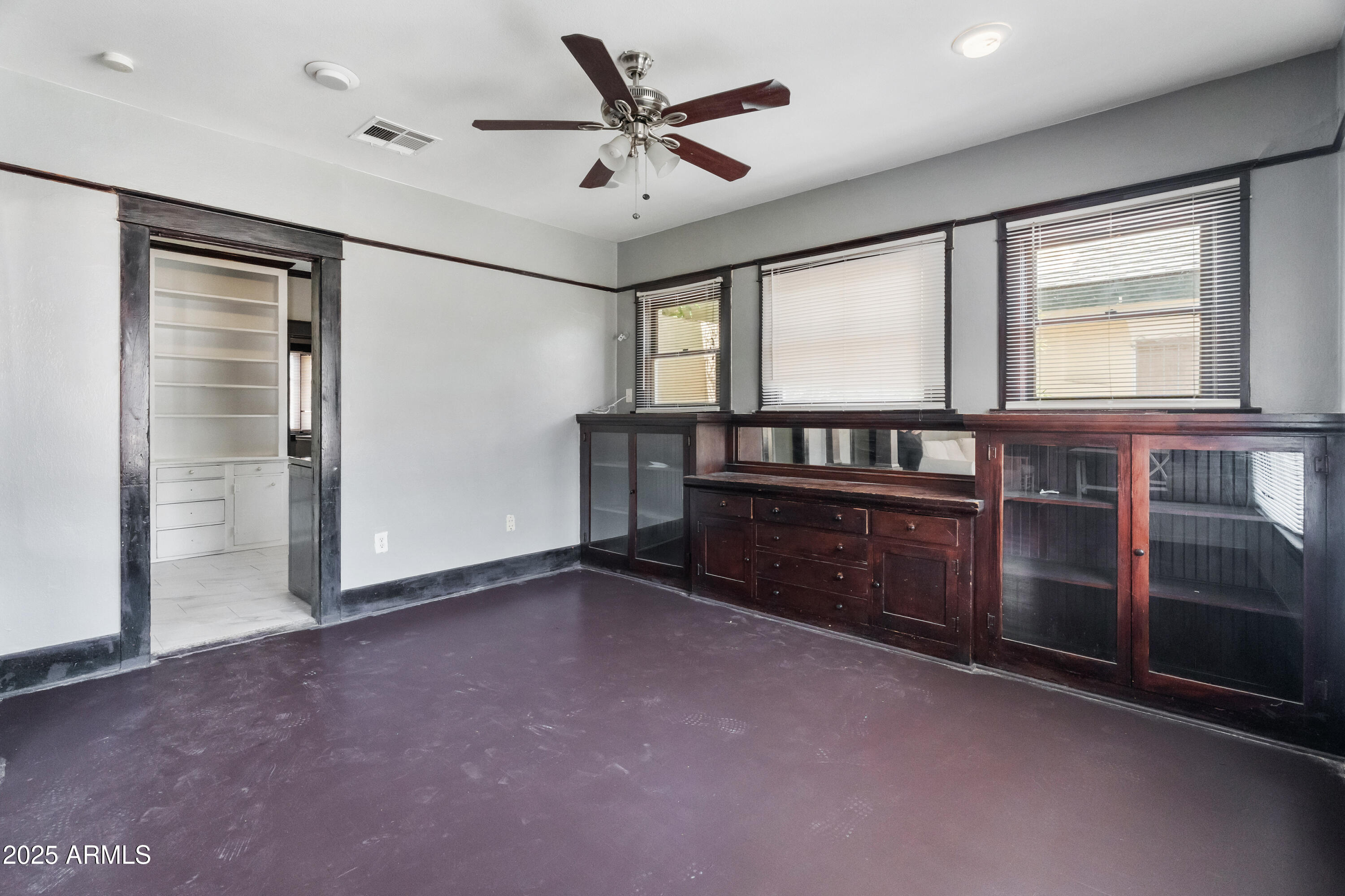 122 North 9th Avenue Phoenix, AZ 85007 - Photo 25 of 43 a view of an empty room with window ceiling fan