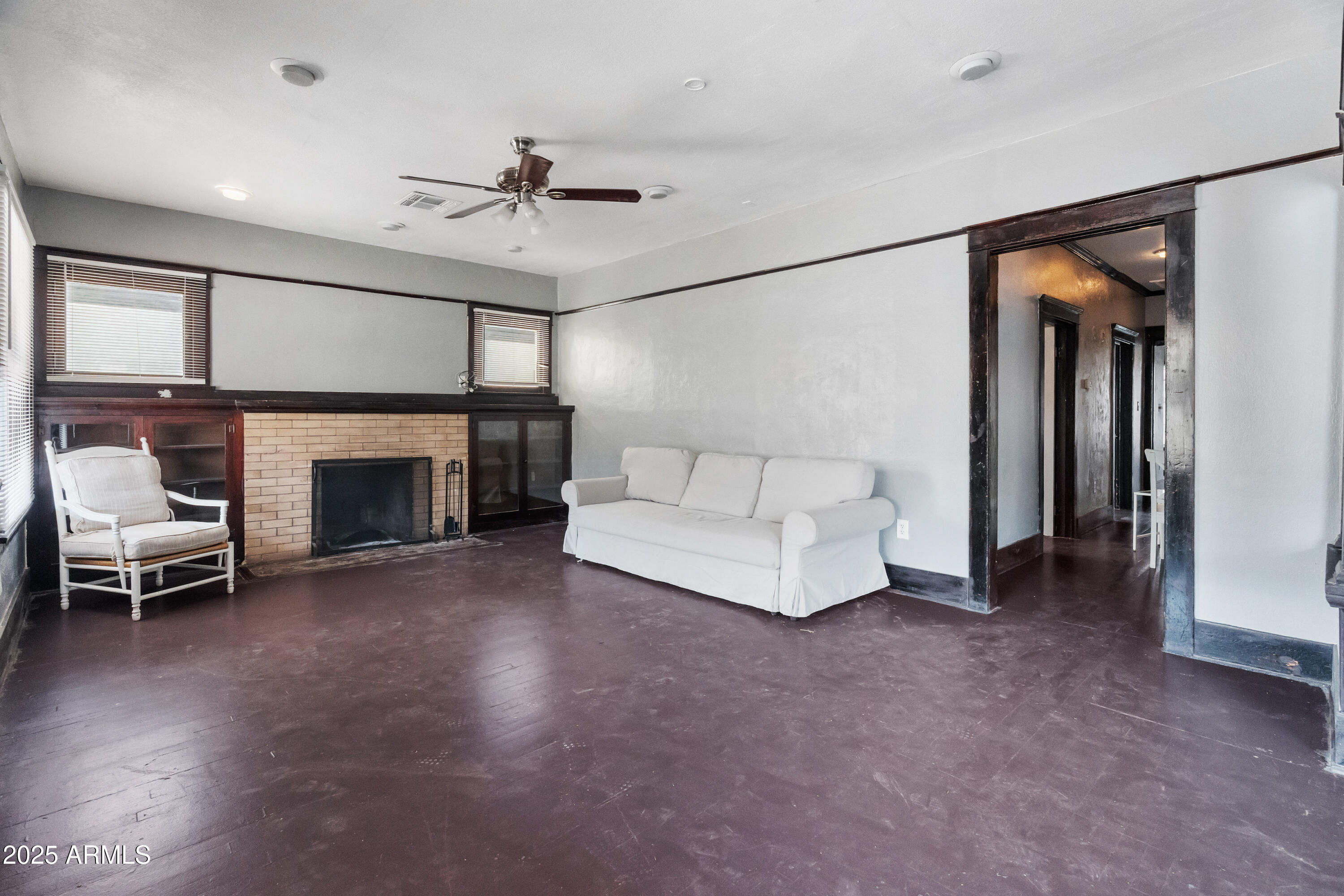 122 North 9th Avenue Phoenix, AZ 85007 - Photo 27 of 43 a living room with furniture and a fireplace